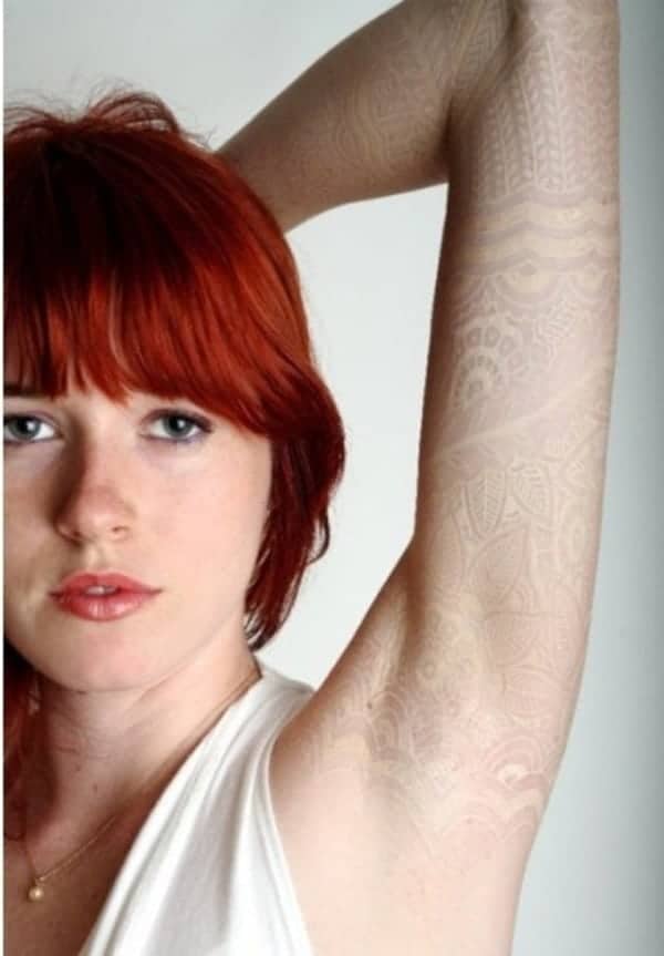 white-tattoo-design-51 "width =" 600 "height =" 863 "src =" https://tattoolist.net/wp-content/uploads/2019/08/1565033552_868_Tendance-Tattoo-155-idees-de-tatouage-inspirantes-a-l39encre.jpg "/><noscript><img decoding=