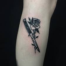 Switchblade Tattoo Signification 9