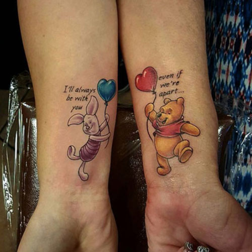 Winnie l'ourson mère fille tatouage