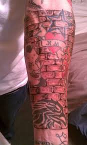 Signification de tatouage de mur de brique 7