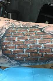 Signification de tatouage de mur de brique 38